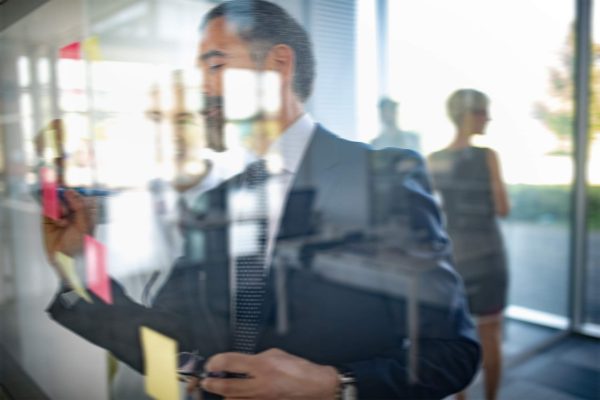 confident-senior-businessman-leader-working-in-off-2023-11-27-05-32-58-3DJHX8Z.jpg